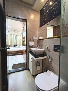 Baðherbergi á VITS Select Grand Inn, Ratnagiri
