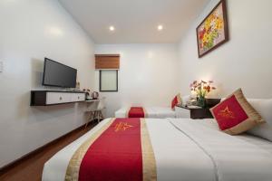 TV a/nebo společenská místnost v ubytování Hanoi Aria Central Hotel & Spa