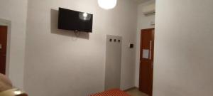 TV a/nebo společenská místnost v ubytování Serendipity