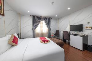 Kuchyň nebo kuchyňský kout v ubytování Hanoi Aria Central Hotel & Spa