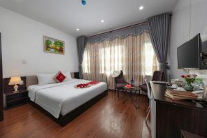 TV a/nebo společenská místnost v ubytování Hanoi Aria Central Hotel & Spa