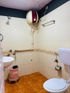 Koupelna v ubytování Nakshatra Inn Kodaikanal Cottage + 16 fotografií