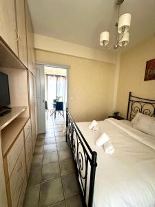 Postel nebo postele na pokoji v ubytování Cozy Apartments Mc Queen