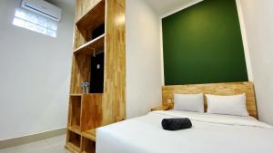 Voodi või voodid majutusasutuse D'Hills Hotel toas