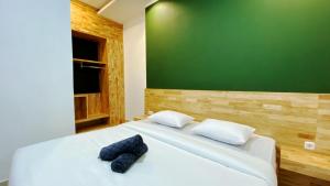 Voodi või voodid majutusasutuse D'Hills Hotel toas