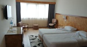 Cama ou camas em um quarto em Hotel Santo Andre mais 37 fotos
