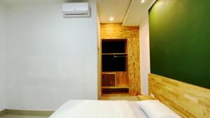 Voodi või voodid majutusasutuse D'Hills Hotel toas