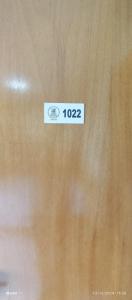 un cartel en una puerta de madera que dice en Apartamento Golden Dolphin-1022, en Caldas Novas 20 fotos más