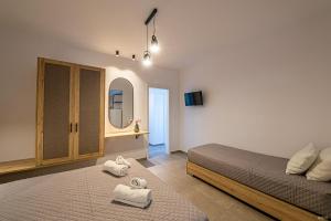 A bed or beds in a room at Katerina View