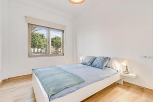 Ένα ή περισσότερα κρεβάτια σε δωμάτιο στο Home2Book Coastal Retreat with Sea Views, Arinaga