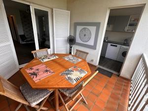 Køkken eller tekøkken på Le brisant ERMITAGE LES BAINS LAGON + 3 billeder