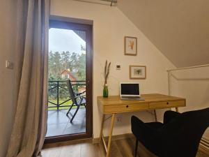 Μια τηλεόραση ή/και κέντρο ψυχαγωγίας στο SAN ESCOBAR sauna jacuzzi jezioro