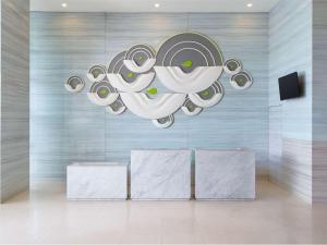 A television and/or entertainment centre at Ibis Styles Malang