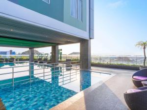 The swimming pool at or close to Ibis Styles Malang