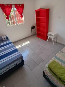 Postel nebo postele na pokoji v ubytování Senderos del sol