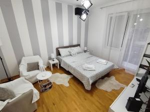 Postel nebo postele na pokoji v ubytování Apartman Nataly 2