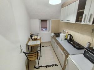 Kuchyň nebo kuchyňský kout v ubytování Apartman Nataly 2