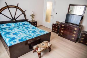 En eller flere senge i et værelse på Randa