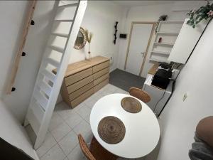 Dapur atau dapur kecil di Bruxelles Nid Douillet et Chaleureux