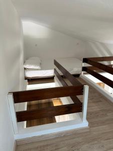 Postel nebo postele na pokoji v ubytování Thekla Guesthouse