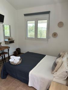 Postel nebo postele na pokoji v ubytování Thekla Guesthouse