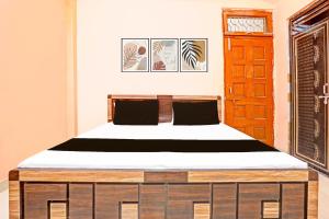 Postel nebo postele na pokoji v ubytování SPOT ON Love Buffet Restaurant & Benquet Holl