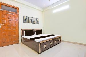 Postel nebo postele na pokoji v ubytování SPOT ON Love Buffet Restaurant & Benquet Holl