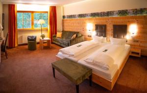 Postel nebo postele na pokoji v ubytování Berghotel Mummelsee