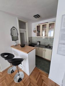 Køkken eller tekøkken på Apartman Mirjana + 7 billeder