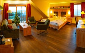 Postel nebo postele na pokoji v ubytování Berghotel Mummelsee