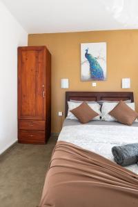 Postel nebo postele na pokoji v ubytování The garden gate resort & Apartments No 01