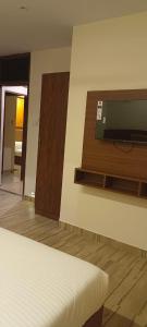 Postel nebo postele na pokoji v ubytování Hotel Le West Near Exhibition Center