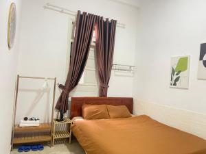 Gallery image of The New House in Ấp Ða Lợi