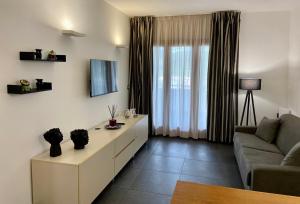 TV a/nebo společenská místnost v ubytování FC Home Suite