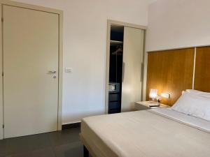 Postel nebo postele na pokoji v ubytování FC Home Suite