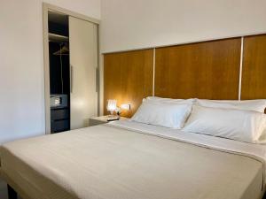 Postel nebo postele na pokoji v ubytování FC Home Suite