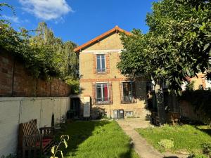 Κήπος έξω από το La Violette - agréable maison jardin RER B - Metro 4