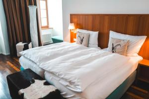 Voodi või voodid majutusasutuse Hotel Pilatus-Kulm toas