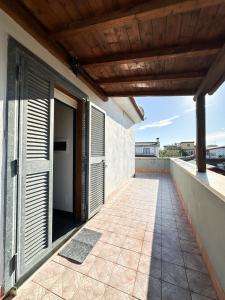 Balkón nebo terasa v ubytování Family Place Fiumicino + 18 fotografií