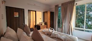 Fotografie z fotogalerie ubytování 3 BHK Mrudgandh Villa, Dapoli Near Tamastirth Beach v destinaci Dapoli + 23 fotografií