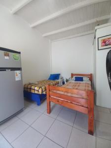 Postel nebo postele na pokoji v ubytování Hostel en Almirante Brown