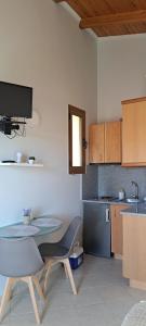 Η κουζίνα ή μικρή κουζίνα στο Stavros Kallia Apartment with sea view