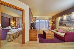Postel nebo postele na pokoji v ubytování Hotel Sommer-Haus am See + 37 fotografií