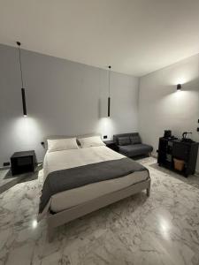 Postel nebo postele na pokoji v ubytování Panta Rei Camere di Charme e Spa