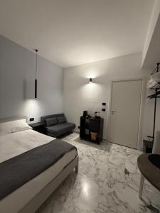 Postel nebo postele na pokoji v ubytování Panta Rei Camere di Charme e Spa