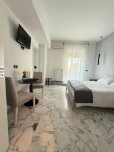 Postel nebo postele na pokoji v ubytování Panta Rei Camere di Charme e Spa