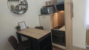 Kuchyňa alebo kuchynka v ubytovaní Deco Studio City Residence