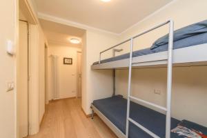 Postel nebo postele na pokoji v ubytování "Vue Du Clocher" - Etroubles Boutique Apartment