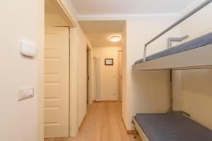 Postel nebo postele na pokoji v ubytování "Vue Du Clocher" - Etroubles Boutique Apartment