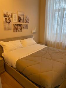 Postel nebo postele na pokoji v ubytování B&b Porta Arpana- Camere & Appartamenti Deluxe in centro